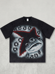 Black acid-wash print featuring a chain-bound monster motif.