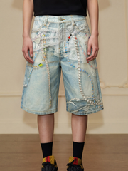 Distressed shorts with 3D pearl chain print